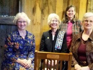 Chapter members with chair donated to Wilson Museum in Castine, Maine